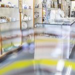 People look through shoes for sale at the Good Cheer Thrift Store. (Olivia Vanni / The Herald)