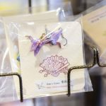 Small origami crane earrings for sale at the Kims Crane at-home showroom.