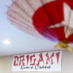 A Kims Crane sign hangs on the wall inside the showroom on Monday, Feb. 17, 2025, in Snohomish, Washington. (Olivia Vanni / The Herald)