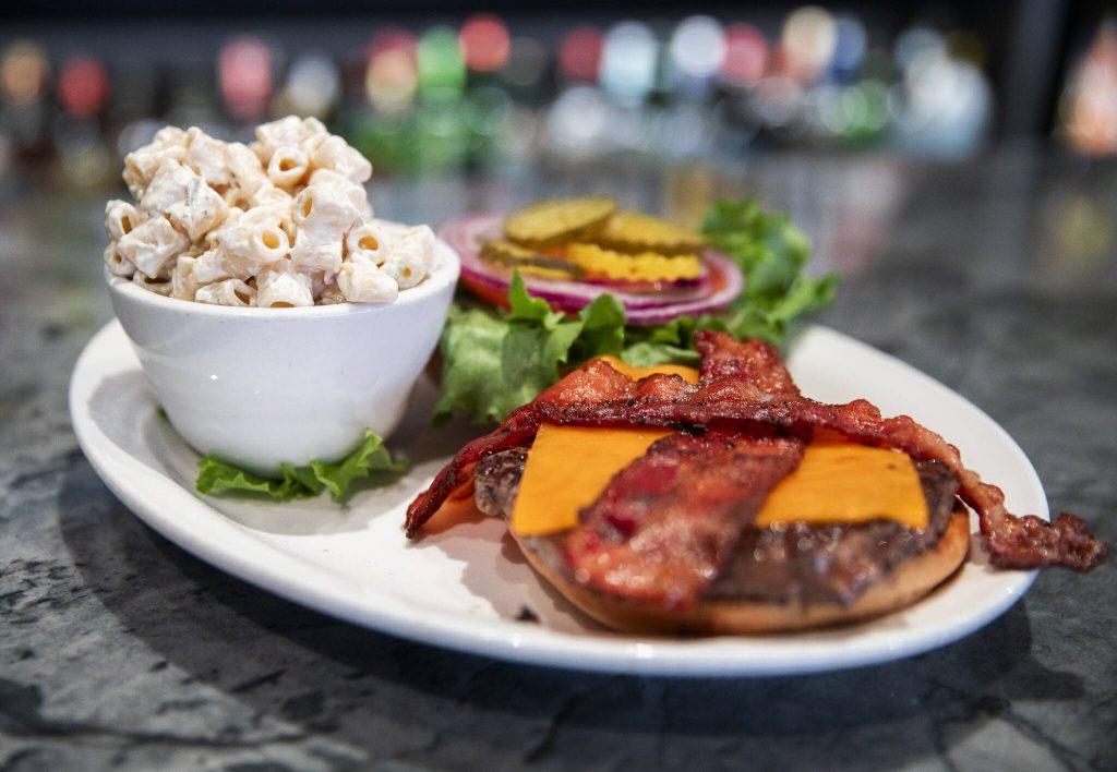 A classic bacon cheeseburger is half-price on Tuesdays at the Madison Avenue Pub. (Olivia Vanni / The Herald)