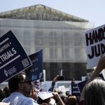 Demonstrators gather as part of the National Law Day of Action outside the Supreme Court in Washington, D.C., May 1. (Tierney L. Cross / The New York Times)
