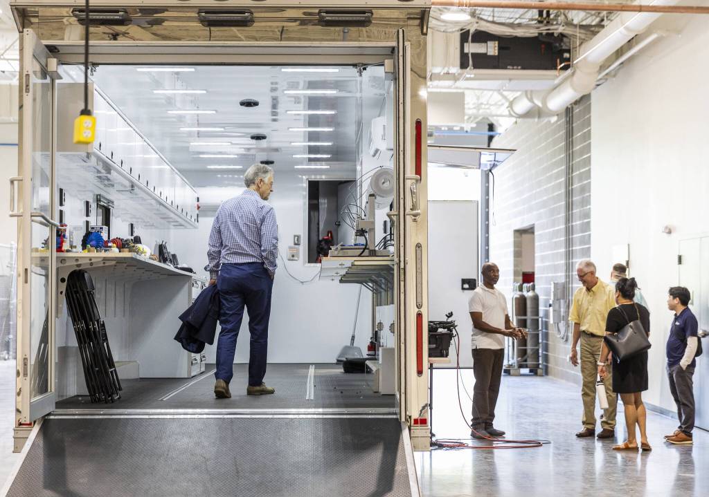 People explore the inside of the new Boeing machinists unions apprentice training center on Friday, June 6, 2025 in Everett, Washington. (Olivia Vanni / The Herald)