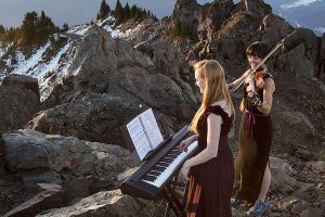 Ian Terry / The Herald

Rose Freeman (center) and Anastasia Allison play atop Sauk Mountain near Concrete on Thursday, Oct. 5. The pair play violin and piano together at sunrise across the Cascades under the name, The Musical Mountaineers.

Photo taken on 10052017