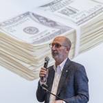 Edmonds Mayor Mike Rosen goes through an informational slideshow about the current budget situation in Edmonds during a roundtable event at the Edmonds Waterfront Center on Monday, April 7, 2025, in Edmonds, Washington. (Olivia Vanni / The Herald)