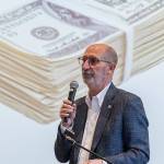 Edmonds Mayor Mike Rosen goes through an informational slideshow about the current budget situation in Edmonds during a roundtable event at the Edmonds Waterfront Center on Monday, April 7, 2025 in Edmonds, Washington. (Olivia Vanni / The Herald)