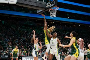 Seattle Storm forward Gabby Williams (5) puts up a shot over Dallas Wings forward Teaira McCowan (15) at Climate Pledge Arena in Seattle on June 3, 2025. (Photo courtesy of the Seattle Storm)
