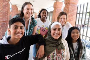 Students attending Camp Killoqua next week pose with Olivia Park Elementary staff on Friday, June 6 near Everett. Top, from left: Stacy Goody, Cecilia Stewart and Lynne Peters. Bottom, from left: Shaker Alfaly, Jenna Alfaly and Diana Peralta. (Will Geschke / The Herald)