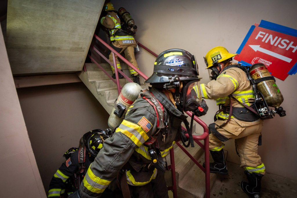 Firefighters near the finish line at the 73rd floor of the Columbia Tower staircase in Seattle during the Leukemia & Lymphoma Society Firefighter Stairclimb on March 9, 2025. (Photo courtesy of Jason Bostic / Bostic Imagery)