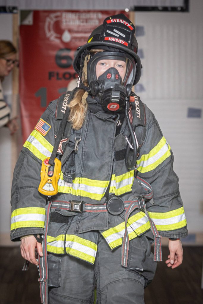 Everett firefighter Bri Harvey arrives at the 73rd Floor of the Columbia Tower staircase in Seattle during the Leukemia & Lymphoma Society Firefighter Stairclimb on March 9, 2025. (Photo courtesy of Jonas Bostic / Bostic Imagery)