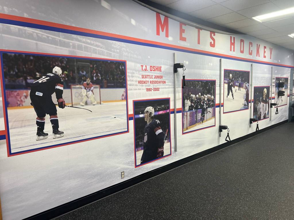 A hallway at Olympicview Arena in Mountlake Terrace, Washington commemorates TJ Oshies youth career with the Seattle Junior Hockey Association (Photo courtesy of Mike Murphy)