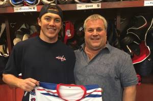 TJ Oshie and Mike Murphy pose for a picture in the Washington Capitals' locker room in Washington, D.C. on Jan. 9, 2018. Oshie and the Capitals would win the Stanley Cup later that season. (Photo courtesy of Mike Murphy)