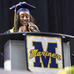 Senior class president Delina Belay smiles while speaking during Mariner High Schools 2025 commencement on Friday, June 13, 2025, at Angel of the Winds Arena in Everett, Washington. (Olivia Vanni / The Herald)