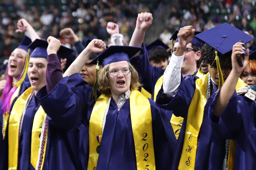 Alice Brackett, center, joins other graduates to sing the schools Alma Mater during Everett High Schools 2025 commencement on Saturday, June 14, 2025, at Angel of the Winds Arena in Everett, Washington. (Mike Henneke / The Herald)
Alice Brackett, center, joins other graduates to sing the schools Alma Mater during Everett High Schools 2025 commencement on Saturday, June 14, 2025, at Angel of the Winds Arena in Everett, Washington. (Mike Henneke / The Herald)