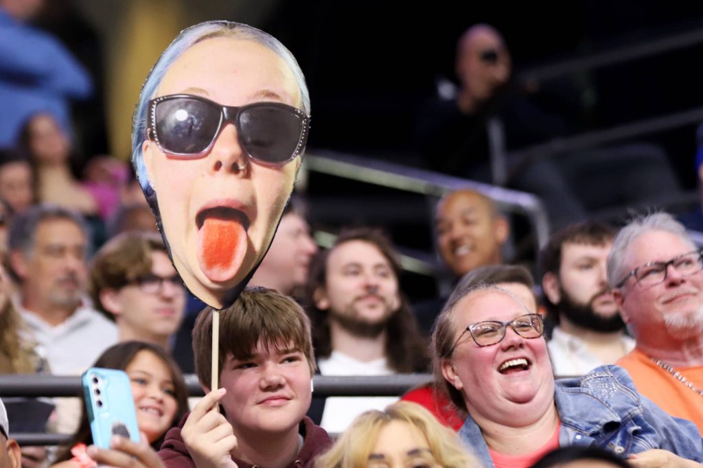 Audience members show support for their favorite graduate during Everett High Schools 2025 commencement on Saturday, June 14, 2025, at Angel of the Winds Arena in Everett, Washington. (Mike Henneke / The Herald)