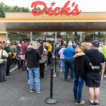 Hundreds wait in line to order after the grand opening of Dick’s Drive-In’s new location in Everett on Thursday, June 12, 2025 in Everett, Washington. (Olivia Vanni / The Herald)