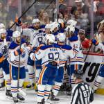 Edmonton Oilers center Leon Draisaitl (29) celebrates with teammates after scoring the game-winning goal in overtime against the Florida Panthers during Game 4 of the NHL Stanley Cup Final at Amerant Bank Arena on Thursday, June 12, 2025, in Sunrise, Fla. (David Santiago / Tribune News Services)