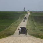 Minnesota State Patrol Special Response Team vehicles on a rural road during a manhunt for a man suspected of assassinating a Democratic state lawmaker and attempting to kill another, in Green Isle, Minn., on June 15. The suspect was identified by the authorities as Vance Boelter, 57. (Tim Gruber / The New York Times)