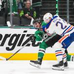 Dallas Stars left wing Mason Marchment passes the puck as Edmonton Oilers defenseman Brett Kulak (27) applies pressure during the third period in Game 1 of Western Conference finals on May 21, 2025, in Dallas. (Smiley N. Pool / The Dallas Morning News / Tribune News Services)