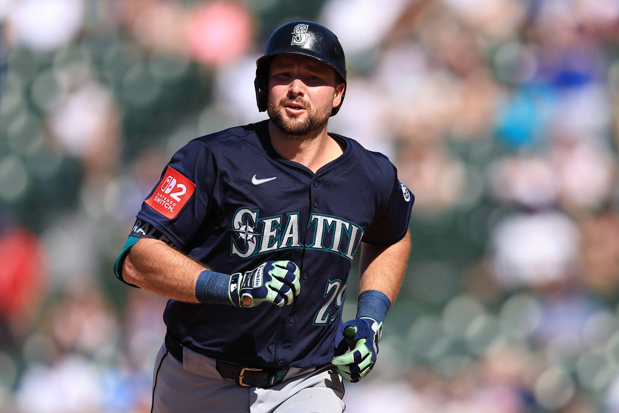 Cal Raleigh of the Seattle Mariners celebrates hitting a solo home run during the ninth inning against the Chicago Cubs at Wrigley Field on Saturday, June 21, 2025, in Chicago. (Geoff Stellfox / Getty Images / Tribune News Services)
