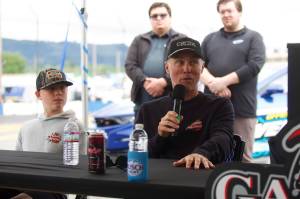 Kevin Harvick (right) speaks at the Mark Galloway 150 Shootout media lunch alongside his son, Keelan, at Evergreen Speedway on Friday. (Joe Pohoryles / The Herald)