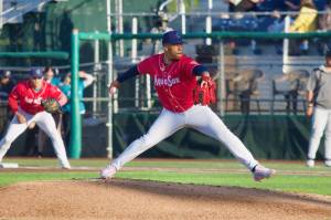 AquaSox pitcher Jurrangelo Cijntje delivers a pitch during Everett's 9-3 loss to the Eugene Emeralds at Funko Field on Saturday. (Joe Pohoryles / The Herald)
