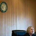 Judge Millie Judge reads Christian Sayres sentence during a hearing Monday, July 21 at the Snohomish County Courthouse in Everett, Washington. (Will Geschke / The Herald)