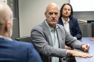 U.S. Rep. Rick Larsen talks with Volunteers of America leadership to discuss the consequences of the federal cuts on Monday, June 30, 2025 in Everett, Washington. (Olivia Vanni / The Herald)