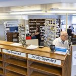 Pharmacist John Sontra and other employees work on calling customers to get their prescriptions transferred to other stores from the Bartell Drugs Pharmacy on Hoyt Avenue on Wednesday, July 2, 2025 in Everett, Washington. (Olivia Vanni / The Herald)