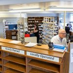 Pharmacist John Sontra and other employees work on calling customers to get their prescriptions transferred to other stores from the Bartell Drugs Pharmacy on Hoyt Avenue on Wednesday, July 2, 2025 in Everett, Washington. (Olivia Vanni / The Herald)