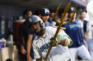 Randy Arozarena of the Seattle Mariners celebrates with the team trident after hitting a solo home run during the sixth inning against the Kansas City Royals at T-Mobile Park on Wednesday, July 2, 2025, in Seattle. (Alika Jenner / Getty Images / Tribune News Services)