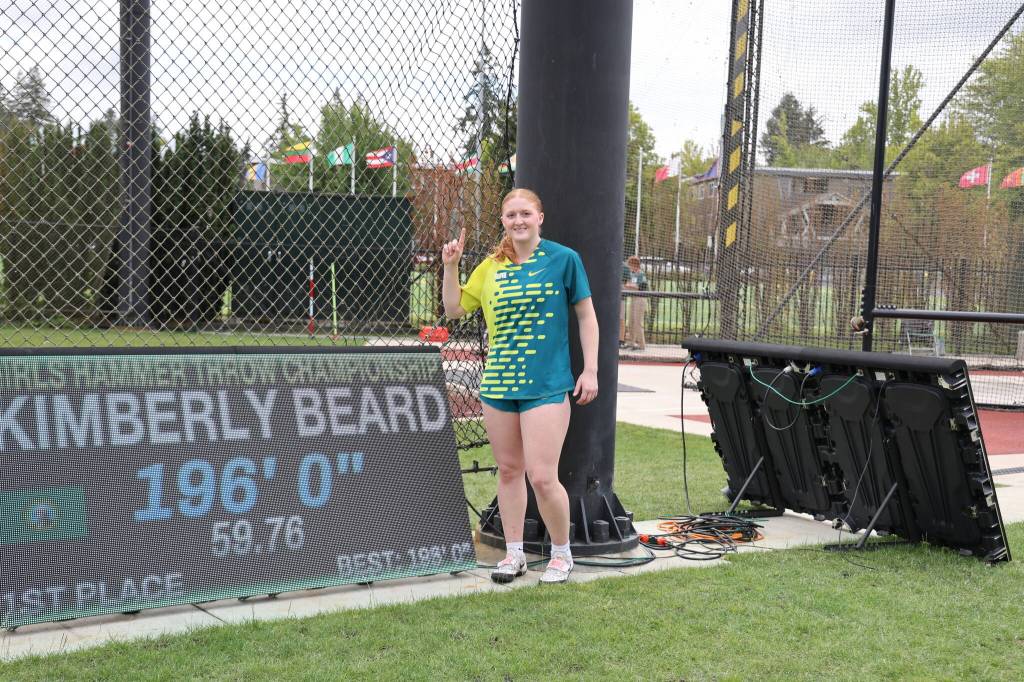 Kimberly Beard, a rising senior at Kings, stands next to the results board after winning the girls hammer throw at the Nike Outdoor National Track & Field Championships in Eugene, Oregon on June 22, 2025. (Photo courtesy Donna Beard)