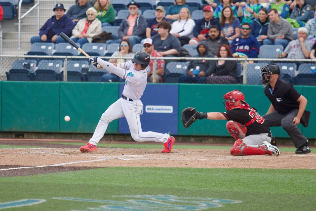 AquaSox outfielder Carson Jones makes contact with a pitch during Everett's 9-2 loss to the Vancouver Canadians at Funko Field on July 4, 2025. (Joe Pohoryles / The Herald)