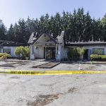 Smoke rises from a burned Center for Human Services building along 204th Street on Monday, July 7, 2025 in Lynnwood, Washington. (Olivia Vanni / The Herald)