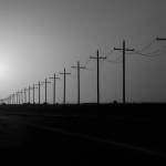 Paul Ratje / The New York Times
The sun sets over power lines in rural Ward County, Texas on May 20, 2025. Republicans terminated billions of dollars in clean energy tax credits with passage of the One Big Beautiful Bill Act. Experts say that will mean more greenhouse gas emissions and more dangerous heat.