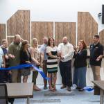 Municipal Court Judge Jessica Ness cuts the ribbon in the new courtroom on Monday, July 14, 2025 in Monroe, Washington. (Olivia Vanni / The Herald)