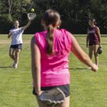Daphnee Calsyn, 12, left, and Camryn Brown, 12, right play catch with Penelope Gahan, 13, center, for warms up on Wednesday, July 16, 2025 in Mill Creek, Washington. (Olivia Vanni / The Herald)