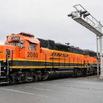A BNSF train crosses Grove St/72nd St, NE in Marysville, Washington on March 17, 2022. Marysville recently got funding for design work for an overcrossing at the intersection. (Kevin Clark / The Herald)
