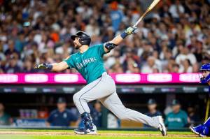 Seattle Mariners designated hitter Cal Raleigh (29) hits a home run during a game between the Detroit Tigers and Seattle Mariners at Comerica Park in Detroit, Michigan, on Friday, July 11, 2025. (Devin Anderson-Torrez / Tribune News Services)