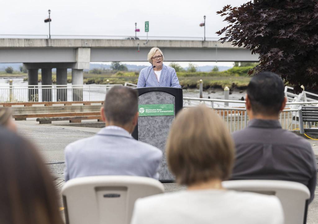 Robin Mayhew, a deputy regional administrator at the Washington Department of Transportation, speaks at a ribbon cutting for the new I-5/SR529 interchange on Tuesday, July 22, 2025 in Marysville, Washington. (Olivia Vanni / The Herald)