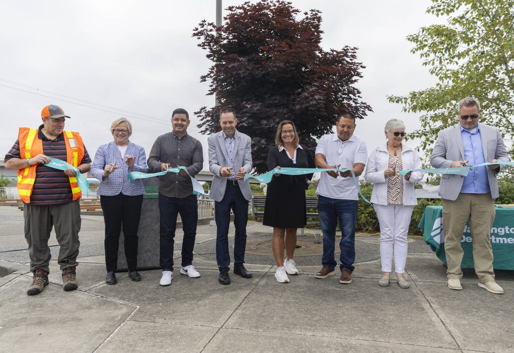 Marysville Mayor Jon Nehring and others cut a ribbon to celebrate the new I-5/SR529 interchange on Tuesday, July 22, 2025 in Marysville, Washington. (Olivia Vanni / The Herald)