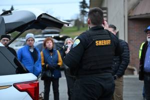 Deputy Kargopoltsev gives a demonstration to community members in Stanwood. (Stanwood Police)