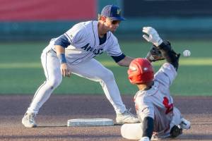 Everett AquaSox infielder Colt Emerson gets an out at second base during the game against the Spokane Indians on Tuesday, July 22, 2025 in Everett, Washington. (Olivia Vanni / The Herald)
