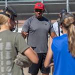 Olivia Vanni / The Herald
Mill Creek Little League softball Coach Courtney Brown talks to his players during practice on July 16 in Mill Creek.