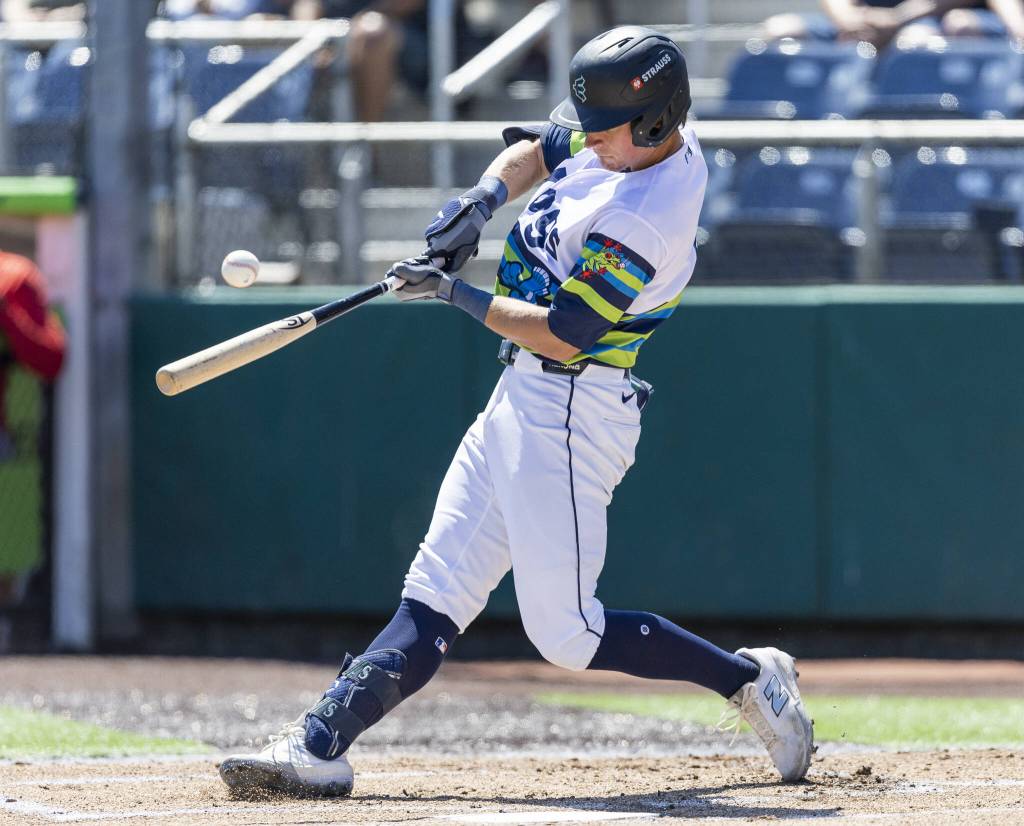 Everett AquaSox infielder Colt Emerson gets a hit during the game against the Spokane Indians on Thursday, July 24, 2025 in Everett, Washington. (Olivia Vanni / The Herald)