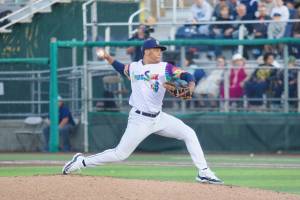 AquaSox pitcher Jurrangelo Cijntje delivers a pitch during Everett's 3-2 win against the Spokane Indians at Funko Field on July 26, 2025. (Joe Pohoryles / The Herald)