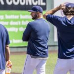 AquaSox pitching coach Matt Carasiti watches the starting pitcher warm-up before the start of a game on Thursday, July 24, 2025 in Everett, Washington. (Olivia Vanni / The Herald)