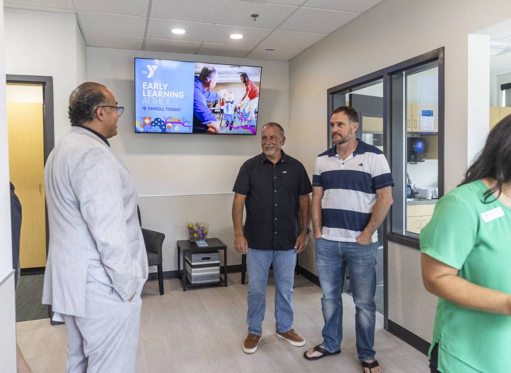 People explore the inside of the new Marysville Family YMCA Early Learning Center on Tuesday, Aug. 5, 2025 in Marysville, Washington. (Olivia Vanni / The Herald)