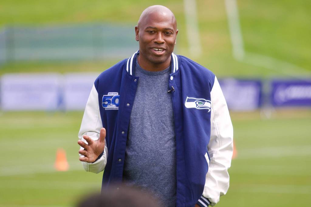 Seahawks legend Shaun Alexander speaks during the USAAs Salute to Service NFL Boot Camp hosted by the Seattle Seahawks at Virginia Mason Athletic Center on Aug. 4, 2025. (Joe Pohoryles / The Herald)