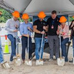Community members and Hope Creek staff break ground for the new Mill Creek Community Food Bank site on Monday, Aug. 4, 2025 in Mill Creek, Washington. (Olivia Vanni / The Herald)