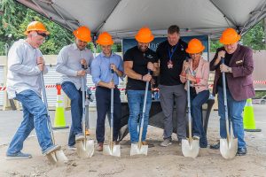 Community members and Hope Creek staff break ground for the new Mill Creek Community Food Bank site on Monday, Aug. 4, 2025 in Mill Creek, Washington. (Olivia Vanni / The Herald)